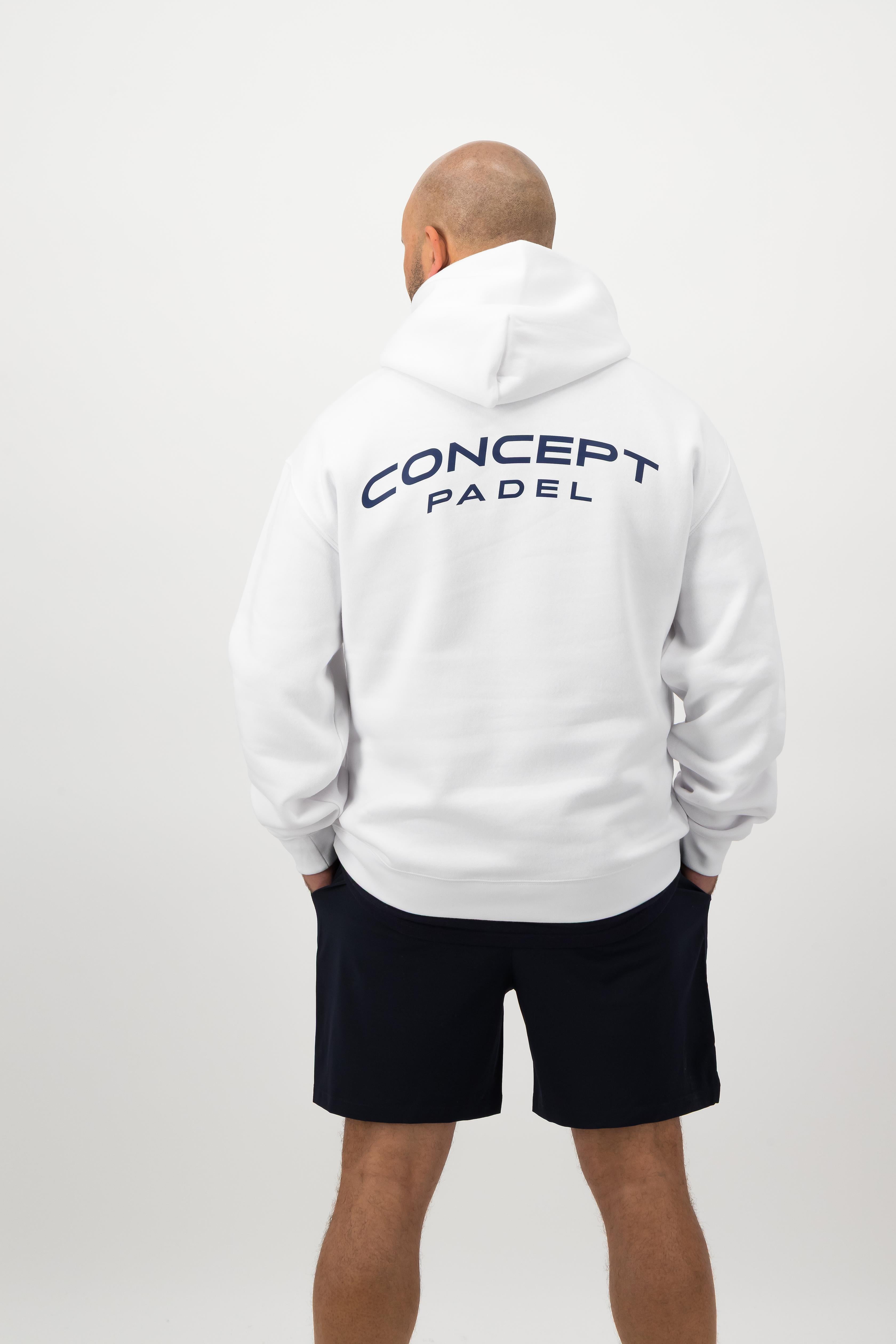 Person wearing a Concept Padel white rebound hoodie standing with back to camera showing the back graphic, styled with black shorts and trainers against a white background