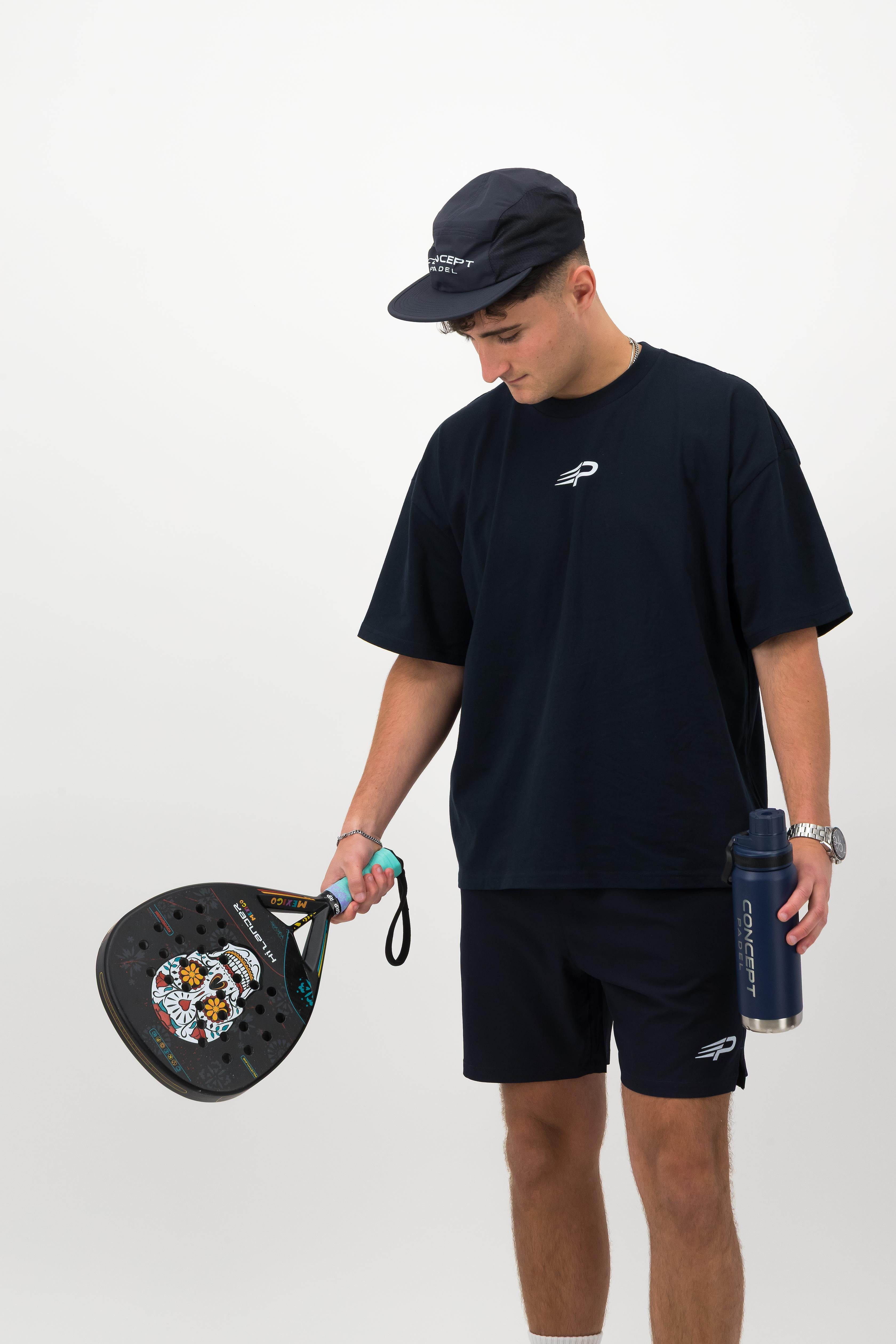 Man wearing navy Concept Padel performance cap front view