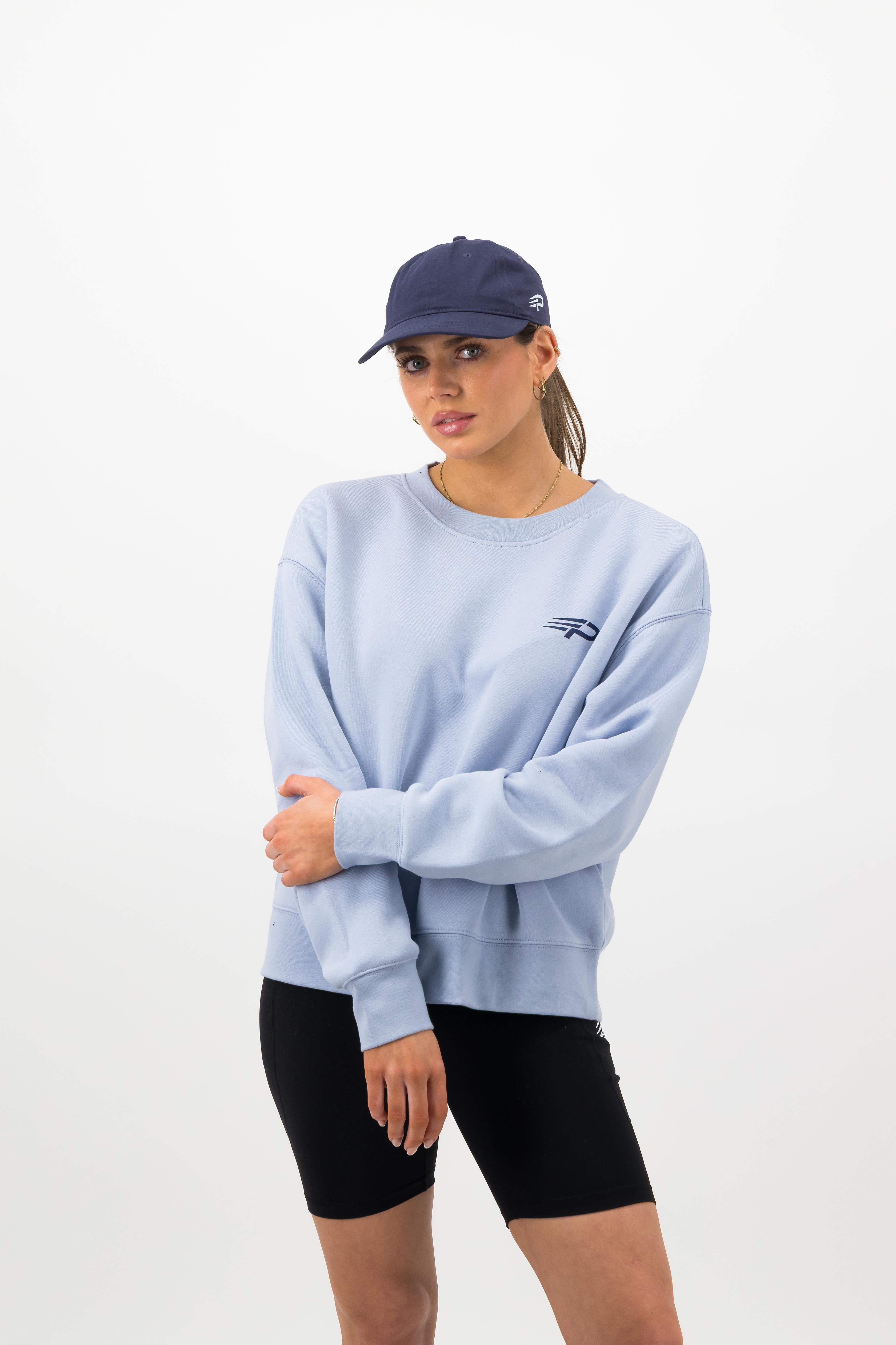 Close‑up of midnight blue Concept Padel cap with white logo