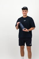 Man wearing navy Concept Padel performance cap