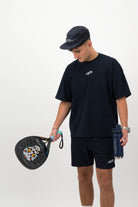 Man wearing navy Concept Padel performance cap front view