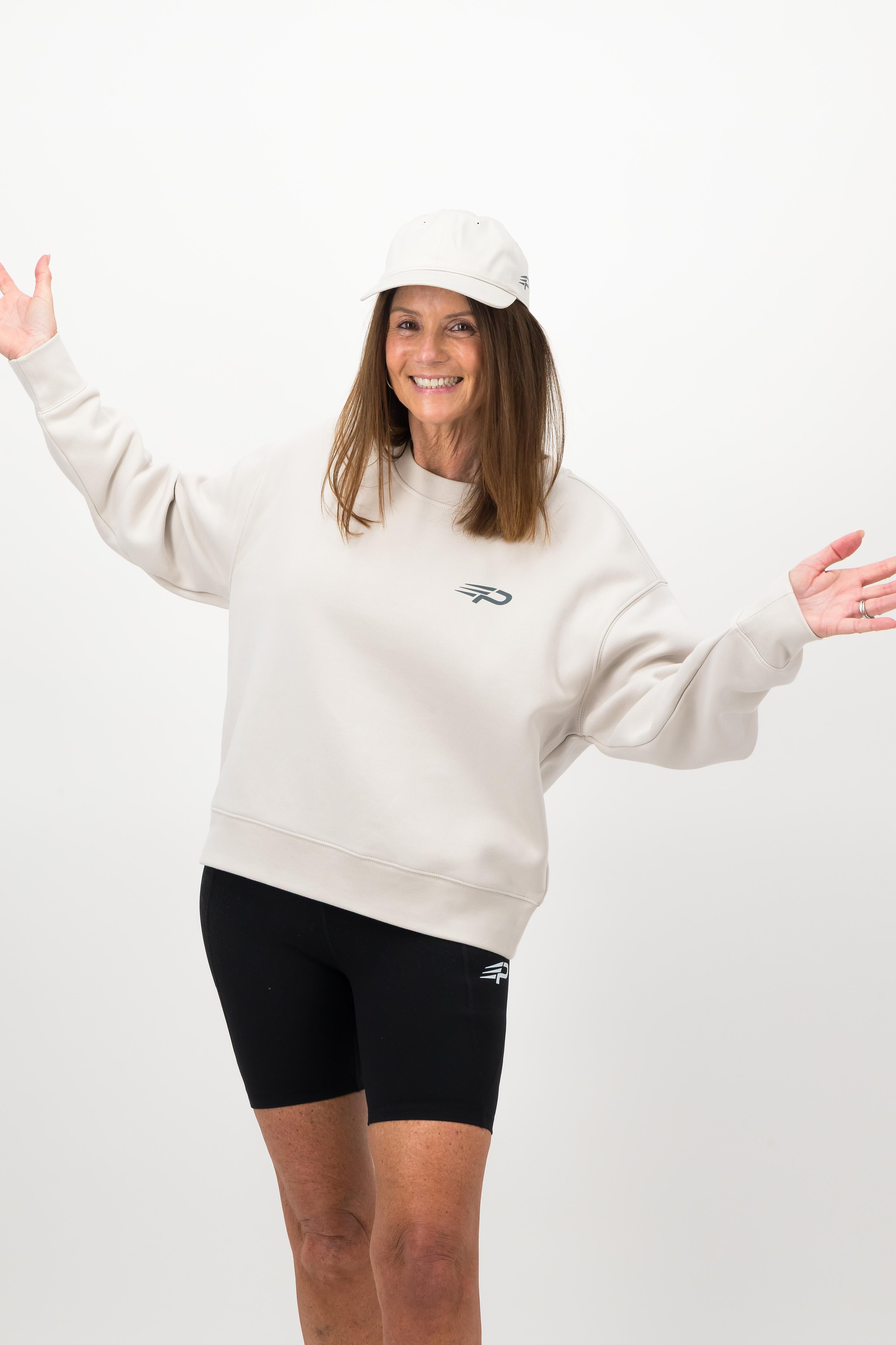 Woman wearing bone Concept Padel cap front view