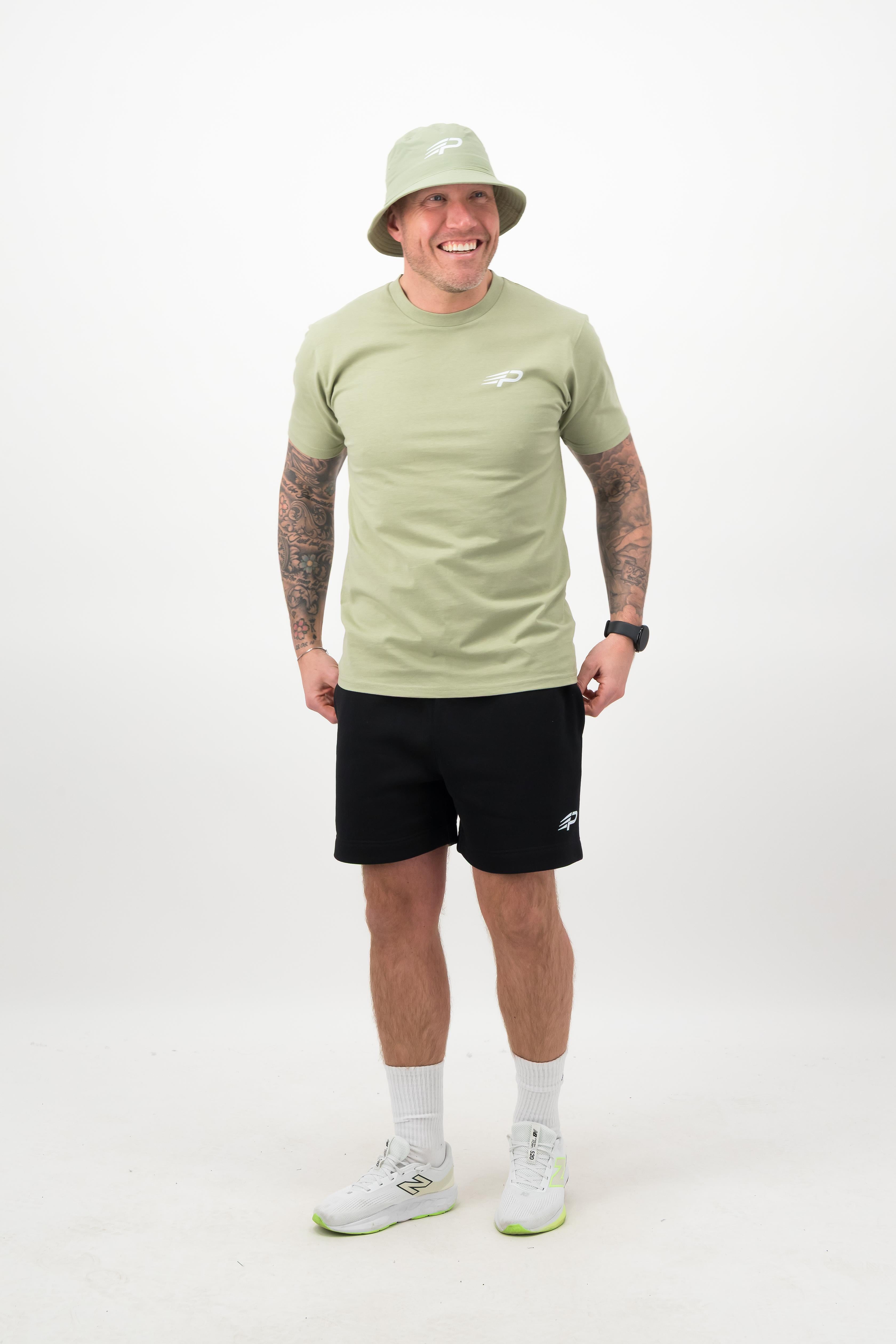 Man wearing pistachio Concept Padel bucket hat front view