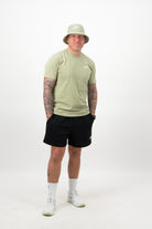 Man wearing pistachio Concept Padel bucket hat